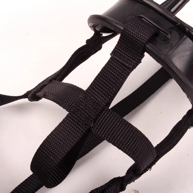 Pet safety dog muzzle for training. Soft silicone, adjustable fit. Prevents biting, chewing, and excessive barking.