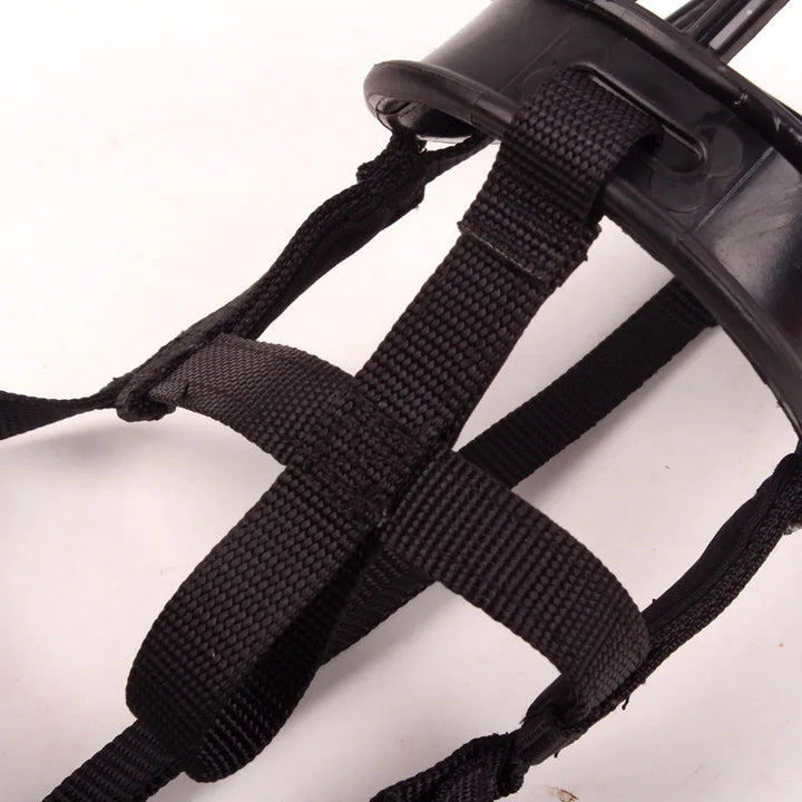 Pet safety dog muzzle for training. Soft silicone, adjustable fit. Prevents biting, chewing, and excessive barking.