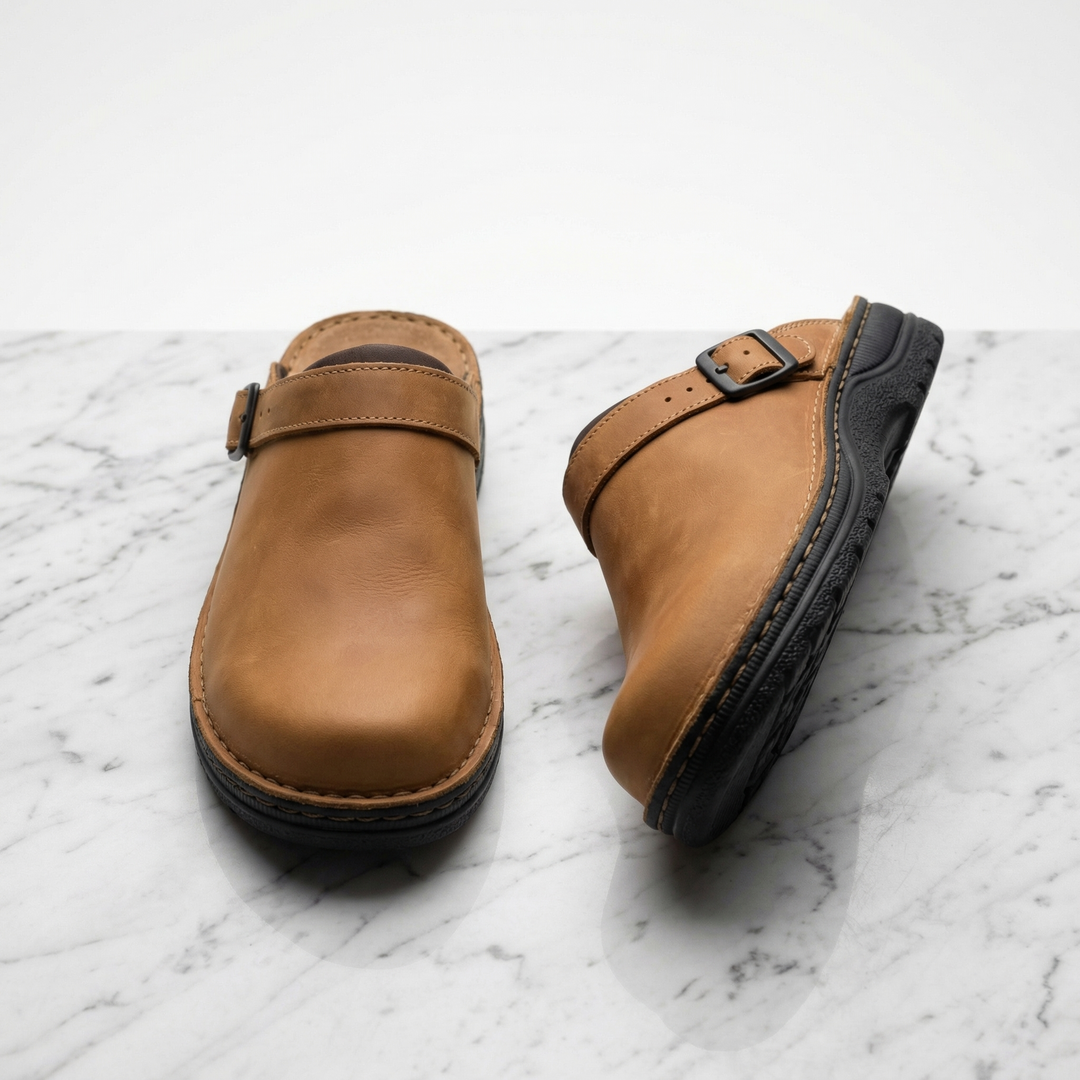 Stylish black slip-on clogs for everyday wear. Unisex comfort footwear, perfect for casual and versatile use.