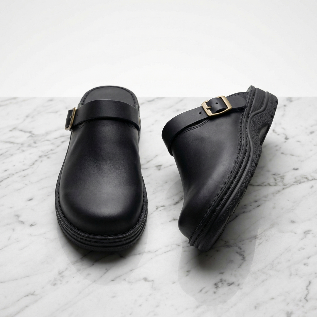 Dark brown unisex comfort clogs. Easy slip-on shoes providing excellent support for everyday casual wear.
