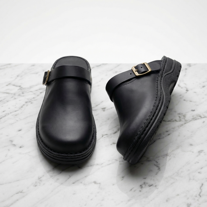 Dark brown unisex comfort clogs. Easy slip-on shoes providing excellent support for everyday casual wear.