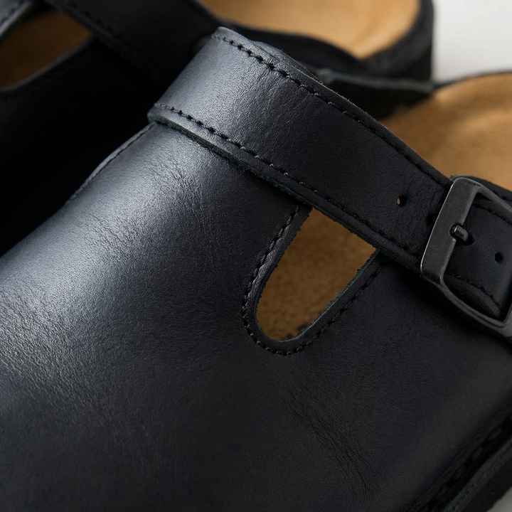Versatile unisex slip-on clogs. Supportive & comfortable footwear, ideal for stylish everyday casual wear.