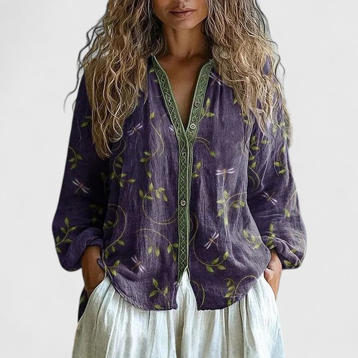 Comfortable women's blouse, versatile for elegant or casual wear, perfect spring/fall style.