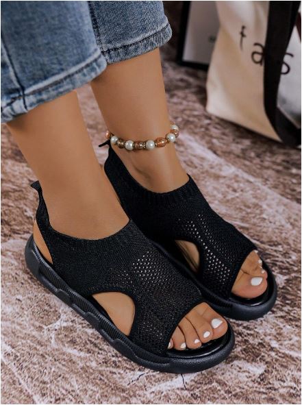 Stylish open-toe women's platform sandals, easy slip-on flatform design.