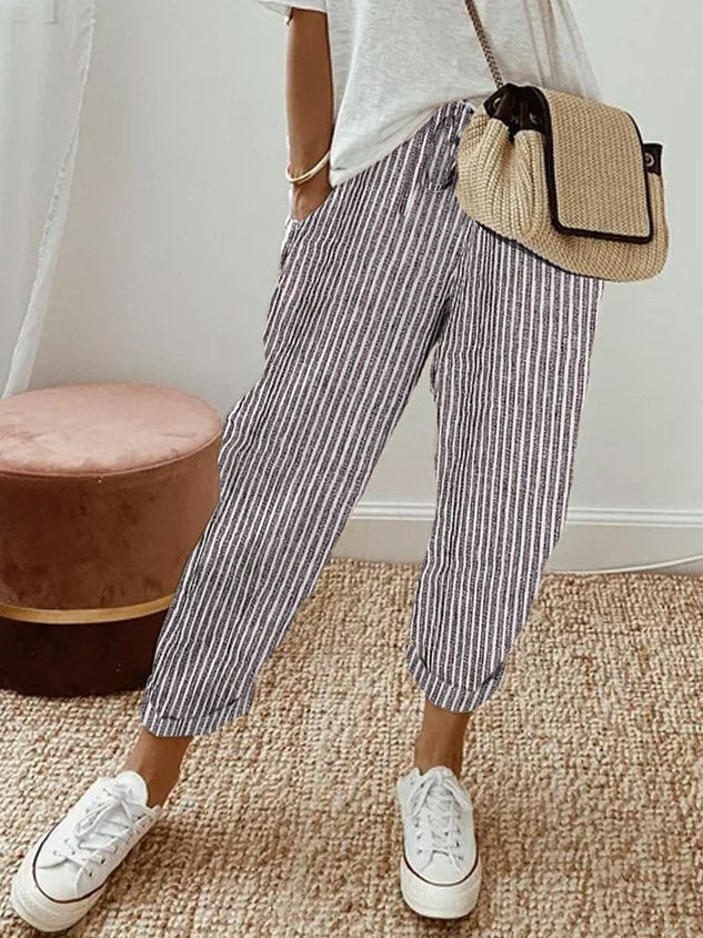 Comfy women's drawstring pants, perfect for relaxed summer style & casual wear. Loose fit elastic waist.
