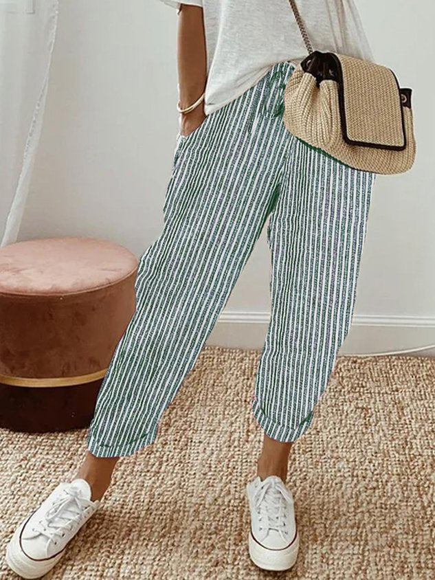 Women's loose fit casual pants, drawstring for comfy summer vacation style. Perfect beach wear.