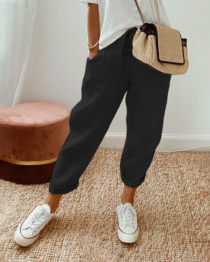 Relaxed fit women's drawstring pants, perfect for summer comfort & casual lounging. Elastic waist style.
