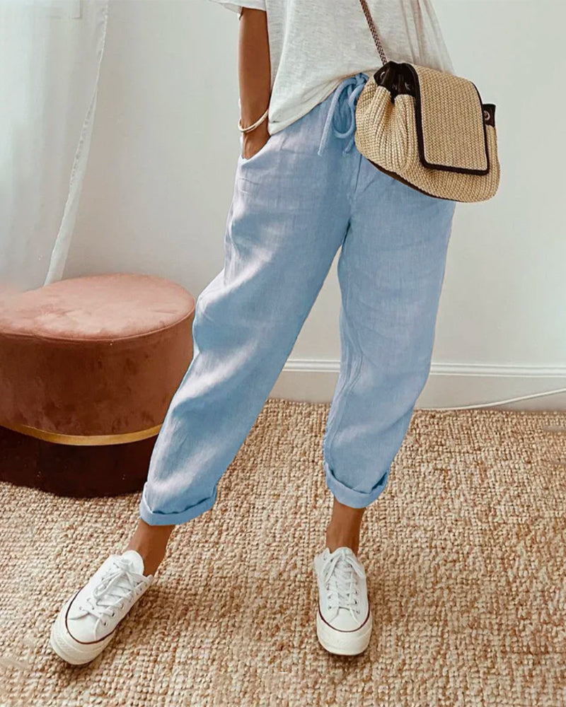 Loose fit women's casual pants with drawstring waist, great for summer, beach, and vacation.