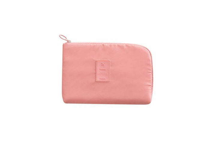 Side profile: sleek waterproof electronics organizer, perfect for cables and chargers on the go.