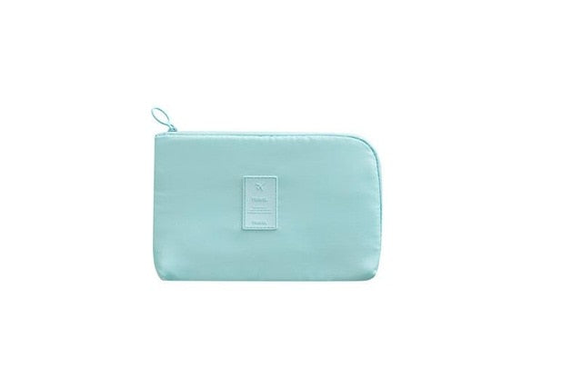Cactus green waterproof electronics organizer. Essential travel tech case for cable management & accessories.