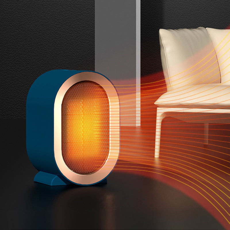 Portable electric space heater, compact design, safety features for desk use.