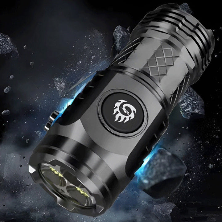 Rechargeable LED flashlight in an outdoor setting, demonstrating its practical use as camping gear