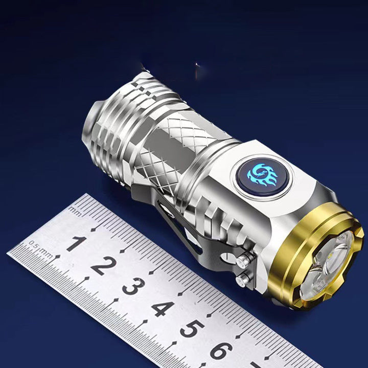 Close-up of the Type-C charging port on a compact multi-mode LED flashlight