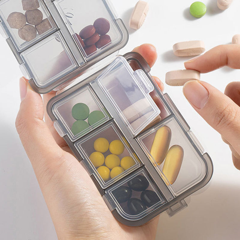 Daily vitamin organizer: compact, portable, and includes 161 labels for clear identification.