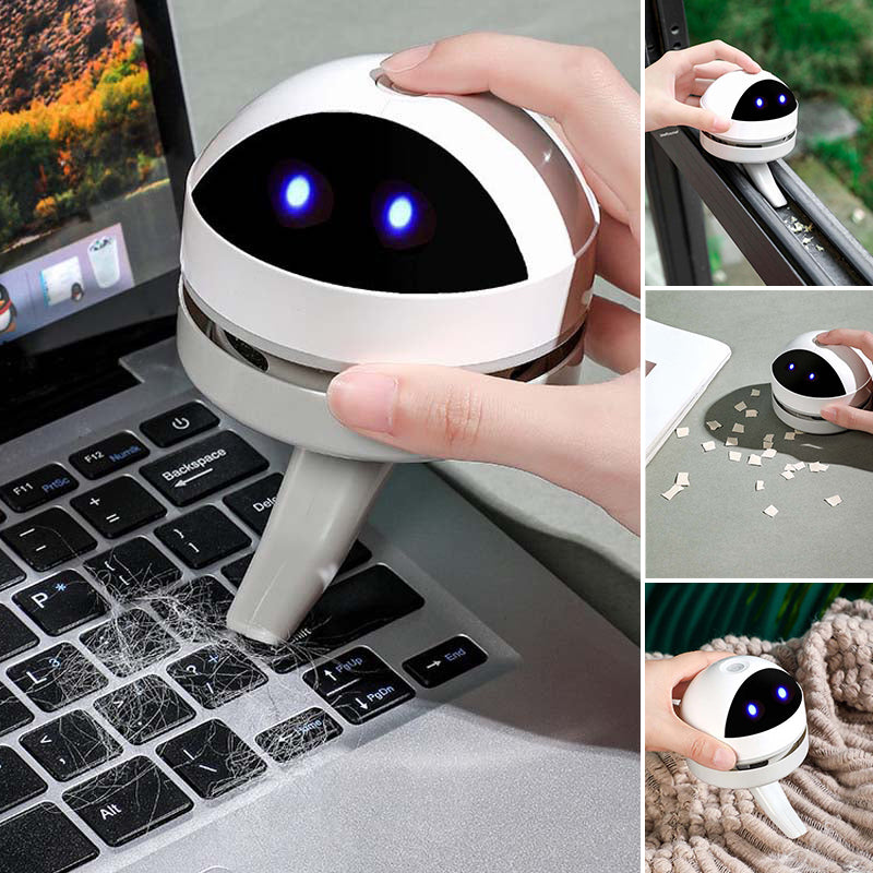 Compact white USB-charged desktop vacuum cleaner, ideal for office and home.