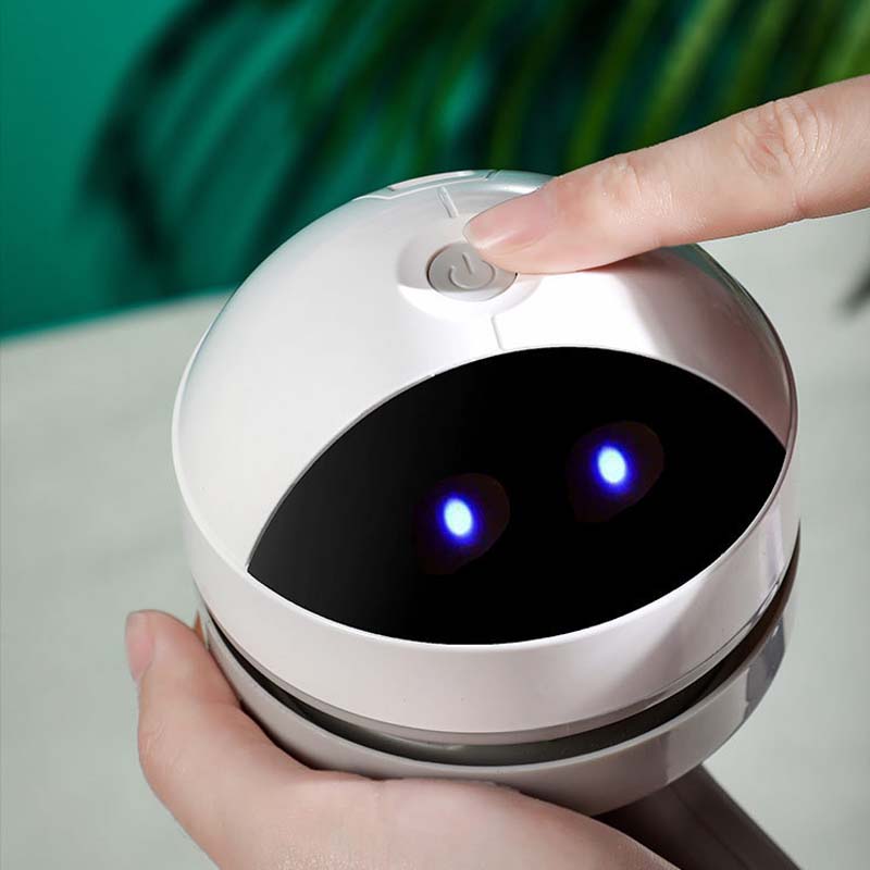 Compact white mini vacuum, perfect for students and professionals in any office setting.