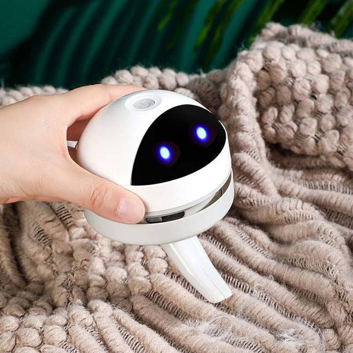 White USB chargeable vacuum for desks, a practical and stylish office accessory gadget.