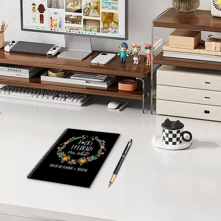 End-of-Life Planner next to a pen and glasses, ready for thoughtful will preparation and organization.