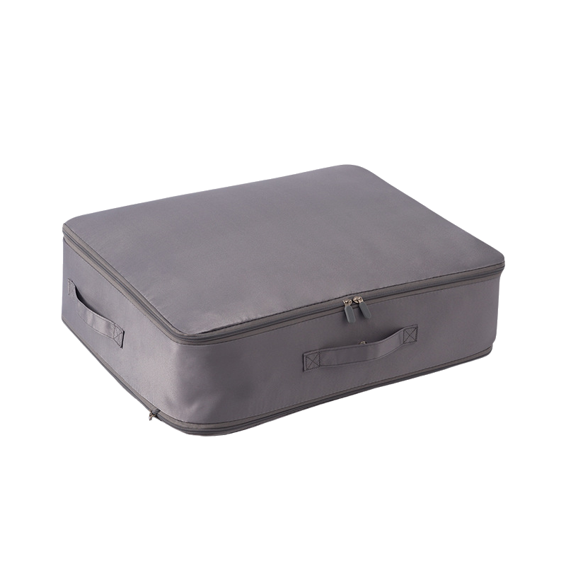 Product shot of a durable, washable compression duvet storage bag for bedding organization