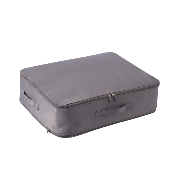 Product shot of a durable, washable compression duvet storage bag for bedding organization