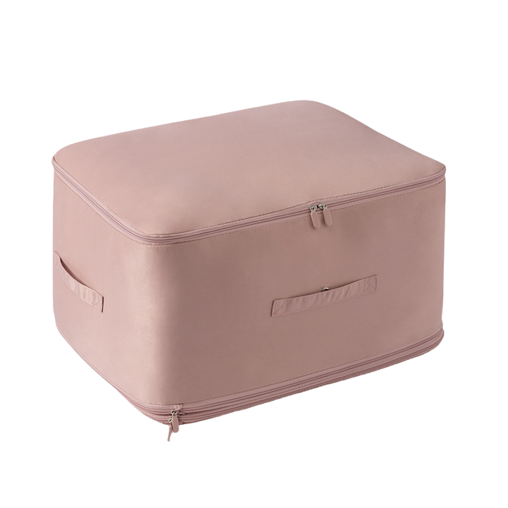 Innovative space-saving duvet compression bag with a smooth satin finish for storage