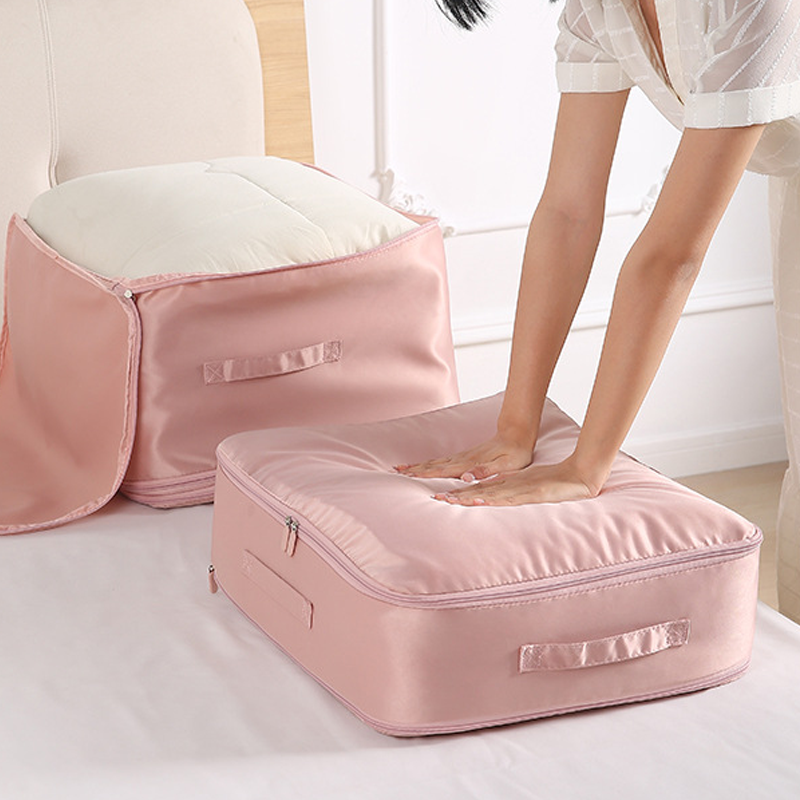 Washable satin compression bag for bedding, designed to organize and save closet space