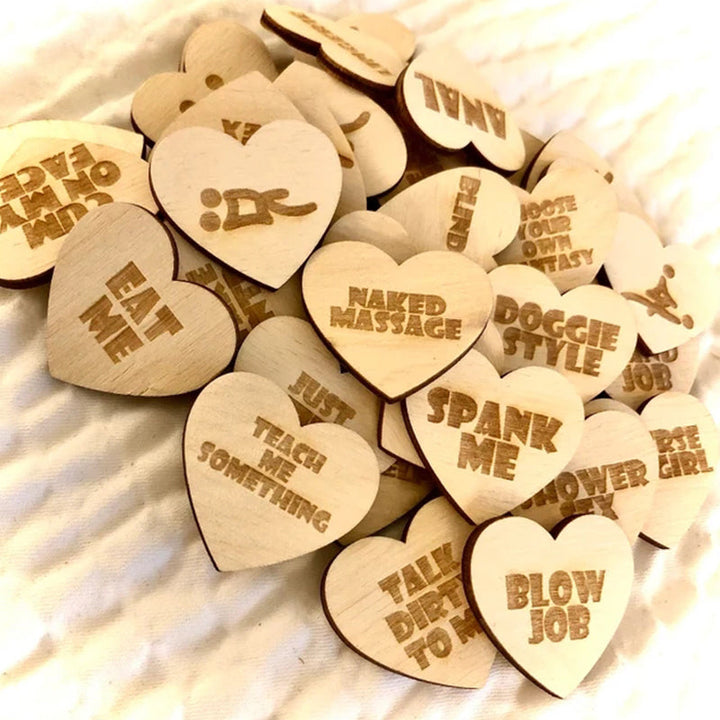 Top-down view of the 'Date Night' wooden box and activity tokens, a romantic gift for couples