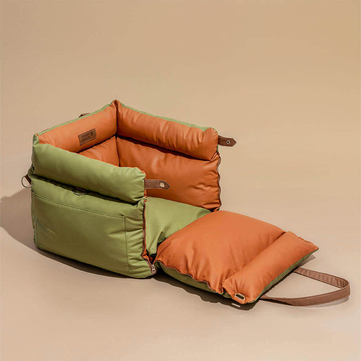 Durable faux leather dog car seat. A secure booster providing comfort for safe pet travel.