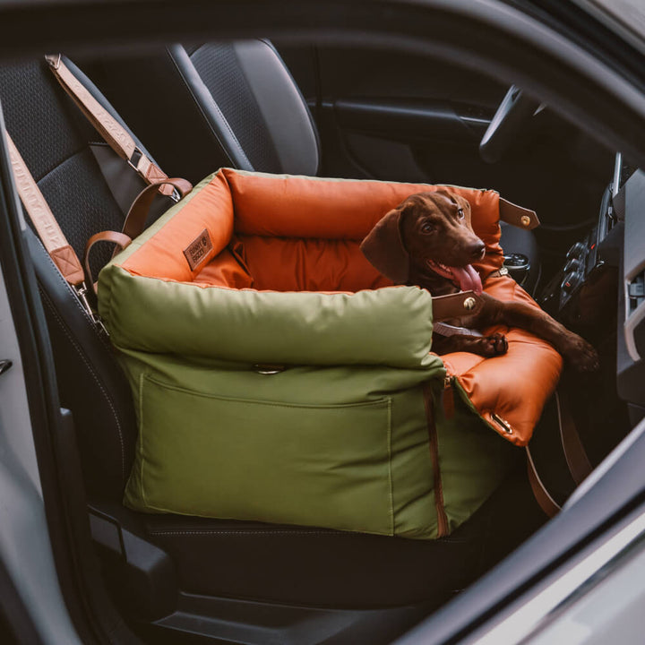 Secure pet car booster seat. Faux leather dog travel bed for safe, cozy rides. PawLuxury pet gear.