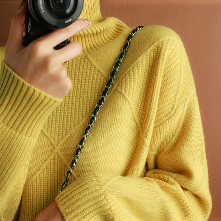 Close-up of the ribbed knit texture on a women's cozy oversized sweater