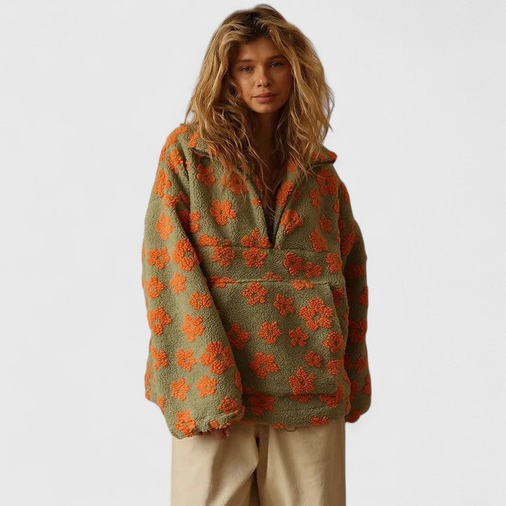Stylish women's floral quarter-zip pullover. Oversized sweater with a cozy feel for everyday casual fashion.
