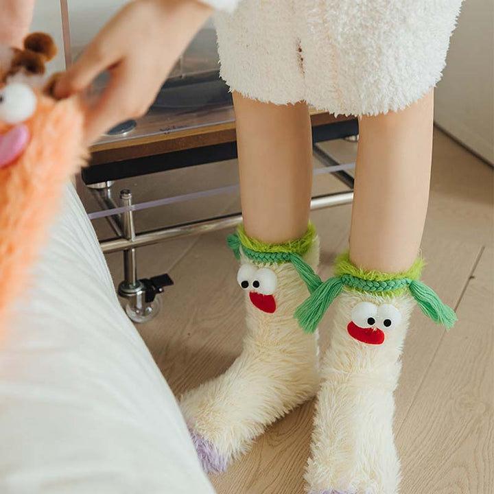 Charming women's monster socks, fluffy warm material, expressive cartoon eyes, cozy wear.