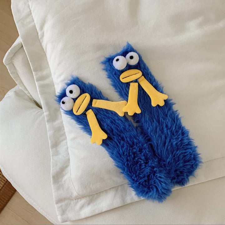 Women's fluffy novelty socks, monster cartoon theme, excellent for keeping feet warm.
