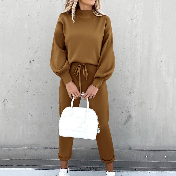 Side view of a woman wearing the comfortable two-piece loungewear tracksuit, showcasing its casual drape.