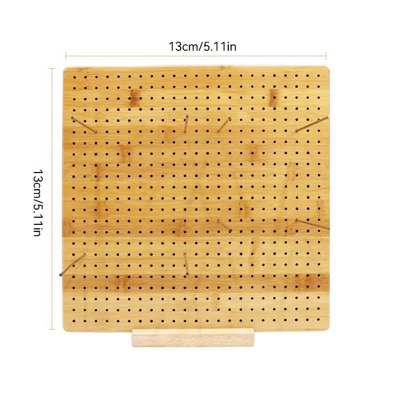 Close-up of knitting hook gauge card, clearly showing different needle sizes for crafters