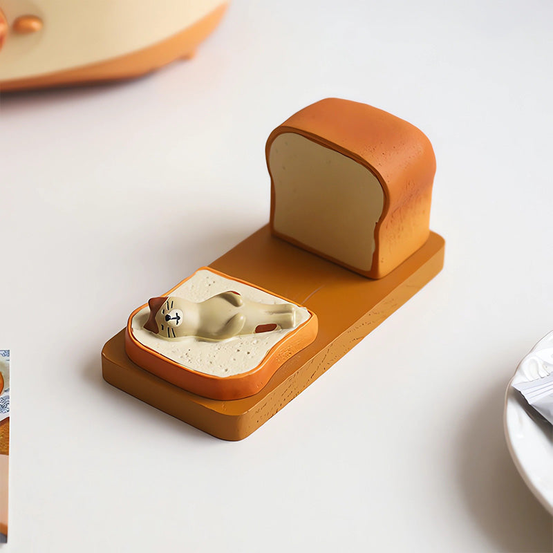 Stylish cat tech accessory, phone stand in white resin, blending decor with functionality for home office