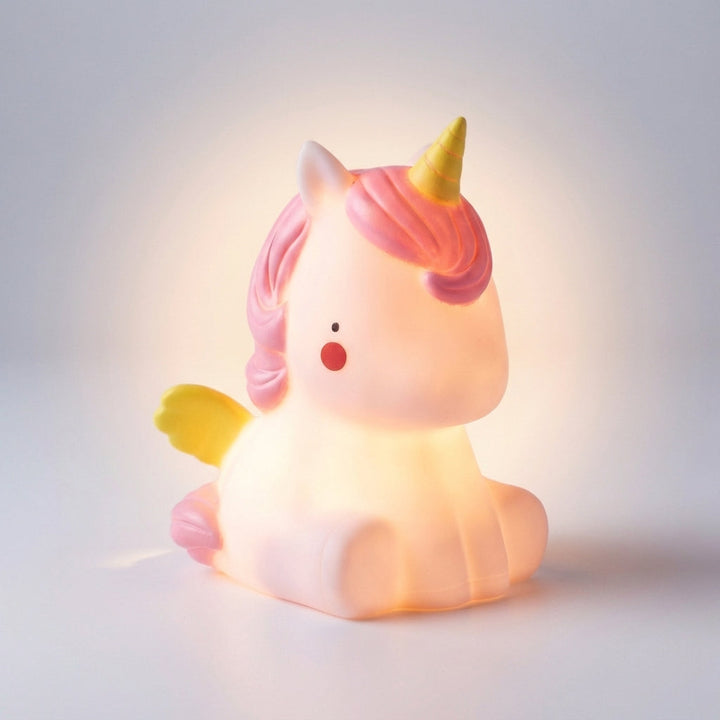 Cozy LED animal night lamp, soft glow for nursery & kids' bedroom, cute Dreamasaur for children.