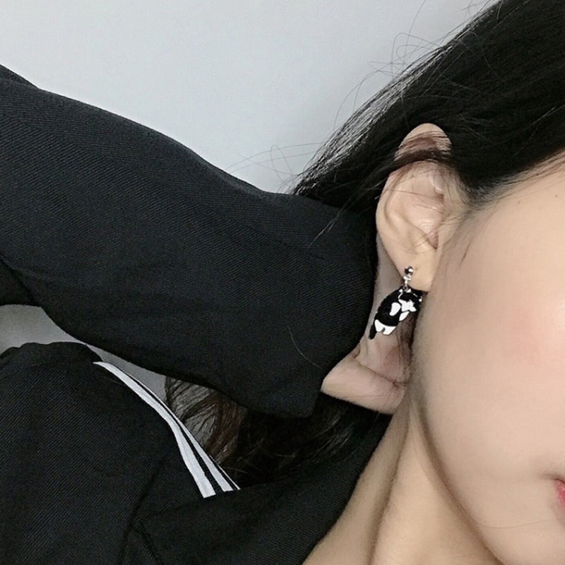 Fashionable cat-themed dangle earrings, crafted from hypoallergenic alloy for sensitive ears.