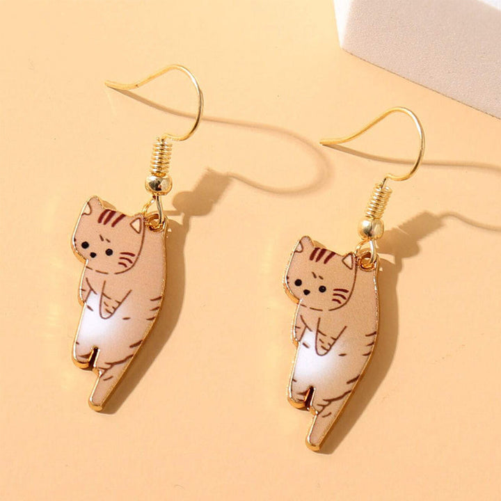 Chic animal jewelry: exquisite feline drop earrings, showcasing a cute and intricate design.