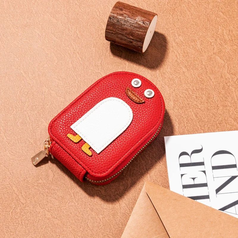 Women's cute penguin PU leather wallet for organizing cards and coins.