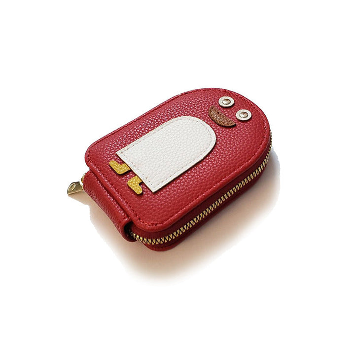 Everyday women's accessory: compact PU leather wallet with cute penguin and coin purse.