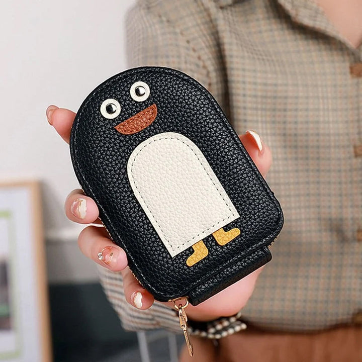 Small women's PU leather wallet with a cute penguin, perfect for cards and change.