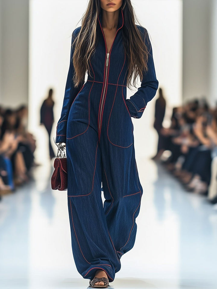 Dark blue wide leg jumpsuit for women with long sleeves & zip front. Perfect for smart casual occasions.