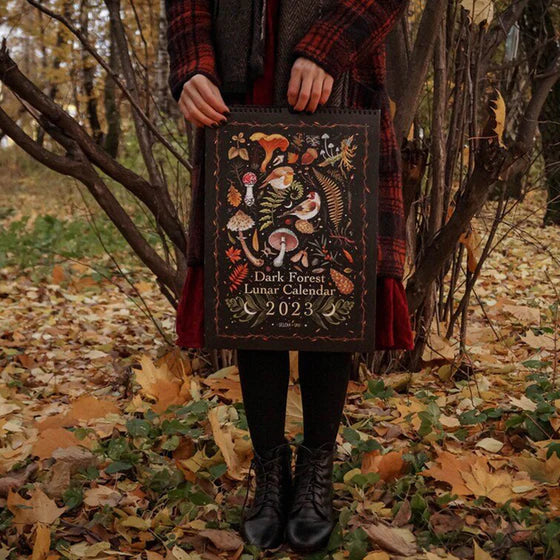 Dark Forest Lunar Calendar, monthly planner for 2024, featuring moon phases and celestial art