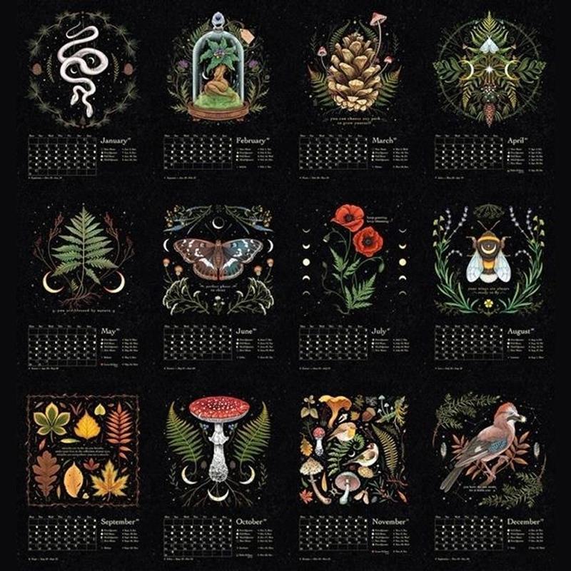 Stack of Dark Forest Lunar Calendars, illustrating their quality and bulk availability for sale
