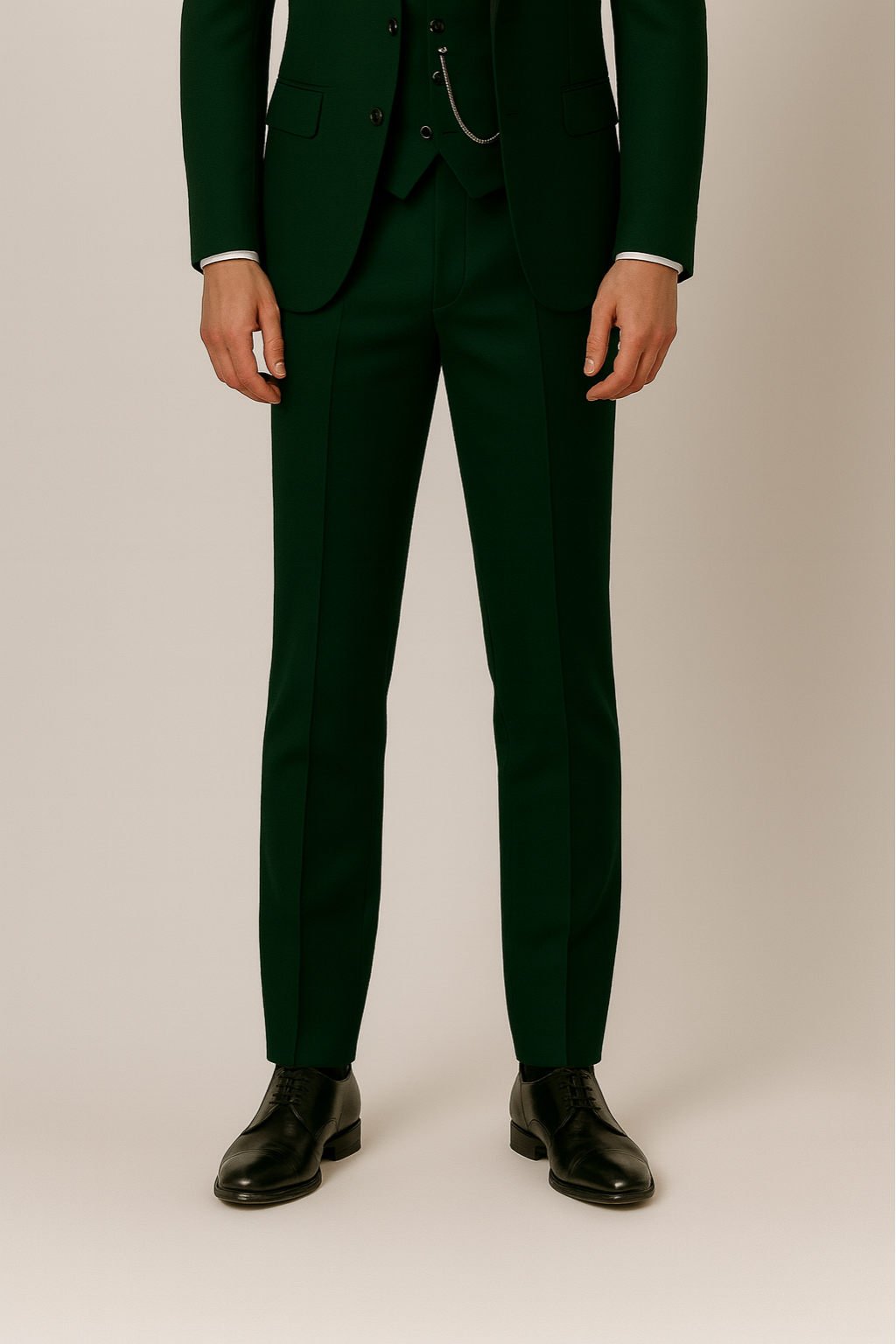 Formal dark green three-piece men's suit, slim fit. Features a stylish contrast lapel, perfect for any special event.