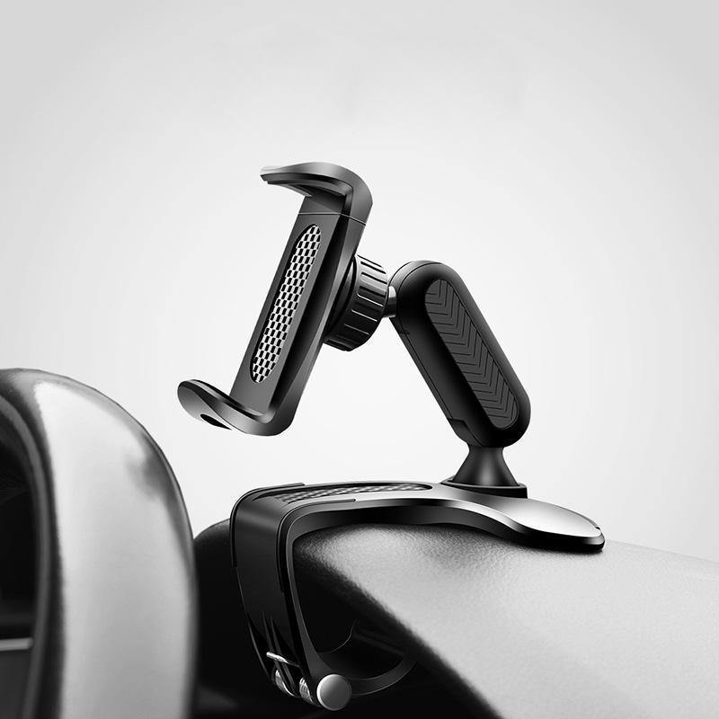 Universal car accessory: phone holder on dashboard, providing easy access to phone