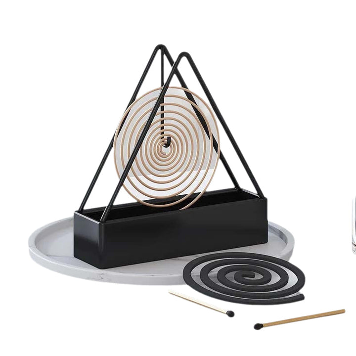 Vintage-inspired iron mosquito coil holder, adding charm while effectively repelling insects.