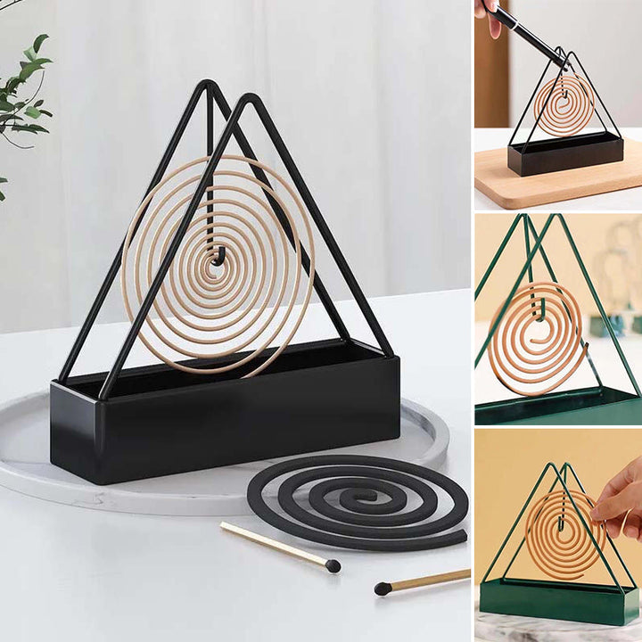 Black iron mosquito coil holder, a chic and functional accessory for burning insect repellent coils outdoors.