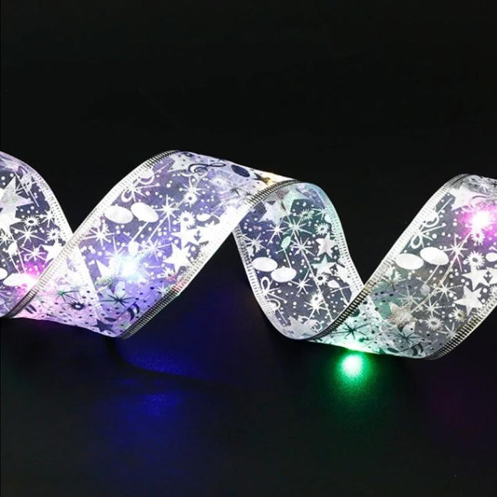 Decorative LED ribbon lights draped over a mantelpiece, creating a warm glow